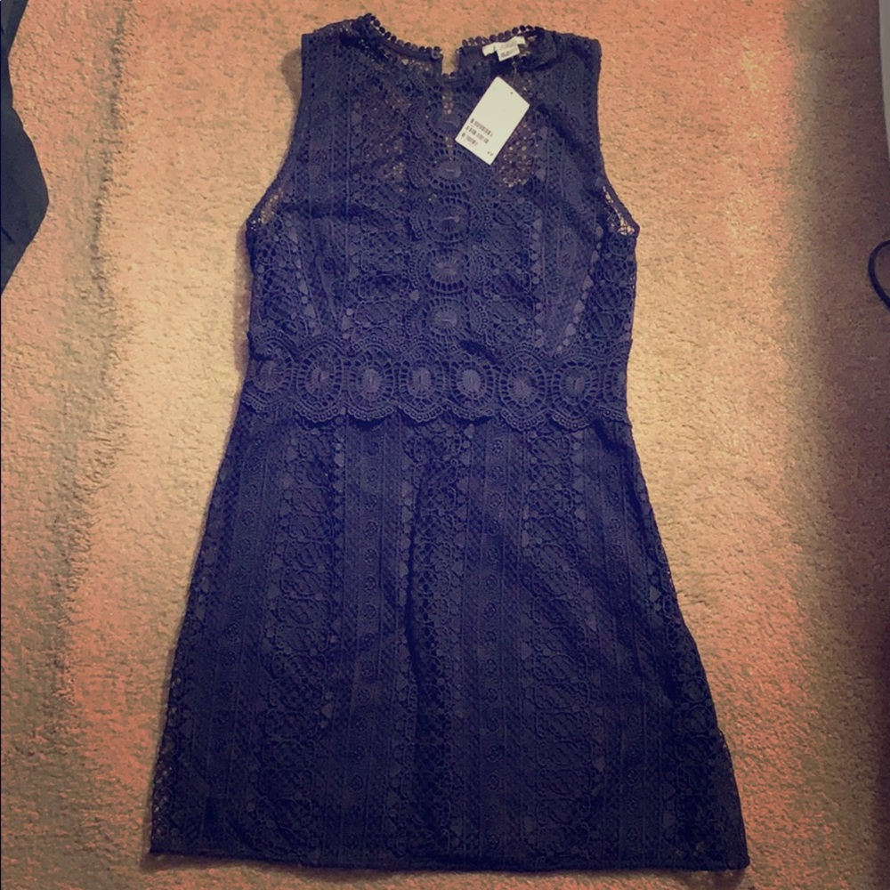 Sleeveless Navy blue lace overlay dress